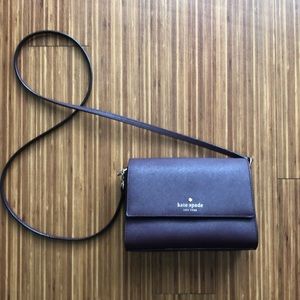 A small Kate Spade crossbody handbag